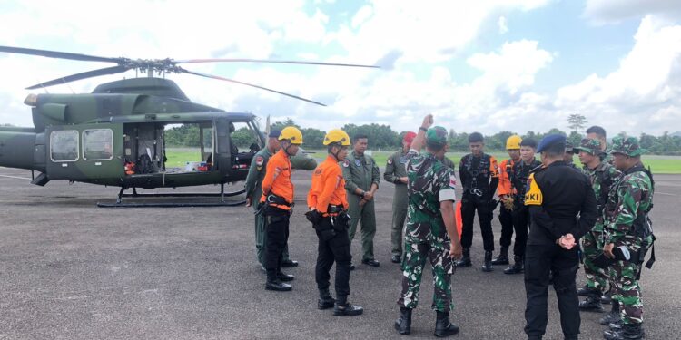 Tim Jalur Udara Mendekati Lokasi Jatuhnya Pesawat PK SNE
